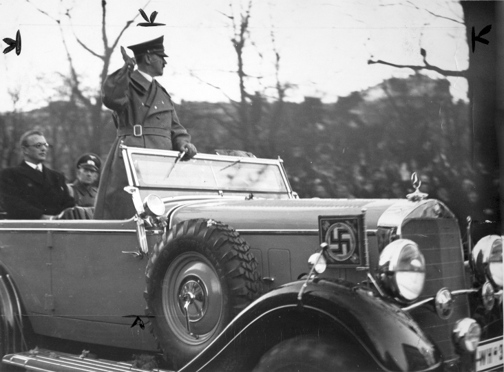 Adolf Hitler enters Vienna with Arthur Seyss-Inquart in the back seat